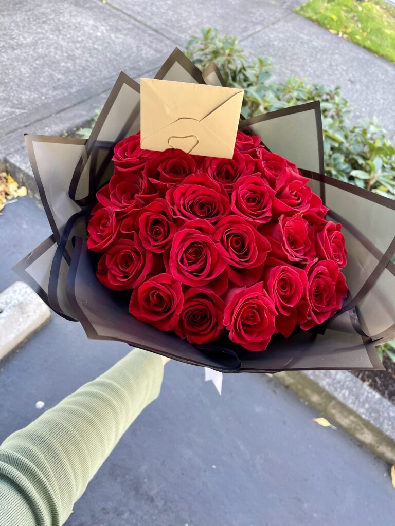 Timeless Rose Wrap by Mary’s Flowers — an all-rose wrapped bouquet available for delivery or curbside pickup in the Portland Metro Area.
